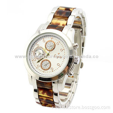 Football star wristwatch with power function, resin and metal match strap, metal case